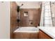Modern bathroom featuring a tub with tiled surround and a shower head at 3272 E Tyson St, Gilbert, AZ 85295
