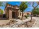 Charming two-story home boasts a welcoming stone facade and a neatly landscaped front yard at 3272 E Tyson St, Gilbert, AZ 85295