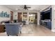 Spacious living room features comfortable seating, hardwood floors, and a glass sliding door at 3272 E Tyson St, Gilbert, AZ 85295