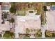 Expansive property featuring a home, putting green, pool, lush landscaping, and manicured grounds at 3306 E Jaeger Cir, Mesa, AZ 85213