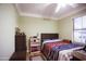 Bedroom with wood floors and natural light at 3306 E Jaeger Cir, Mesa, AZ 85213