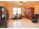 Bright exercise room with modern equipment, ceiling fan, and neutral walls at 3306 E Jaeger Cir, Mesa, AZ 85213