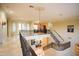 Elegant foyer showcasing a grand staircase, wrought iron railings, and a dazzling chandelier at 3306 E Jaeger Cir, Mesa, AZ 85213
