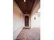 Arched front doorway shows the detailed architecture and welcoming ambiance of this home at 3306 E Jaeger Cir, Mesa, AZ 85213