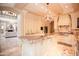 Spacious kitchen featuring granite countertops, and a large center island at 3306 E Jaeger Cir, Mesa, AZ 85213