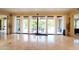 Expansive living space with seamless indoor-outdoor flow through large sliding glass doors to the patio at 3306 E Jaeger Cir, Mesa, AZ 85213