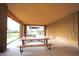 Spacious pavilion interior featuring picnic tables, offering a comfortable space for community gatherings at 3306 E Jaeger Cir, Mesa, AZ 85213