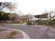 Neighborhood playground with shade coverings, play structures and green space for community enjoyment at 3306 E Jaeger Cir, Mesa, AZ 85213