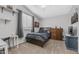 Cozy bedroom showcasing vaulted ceiling, neutral walls, plush carpet, dark wood furniture, and natural light at 3411 S Vine St, Chandler, AZ 85248