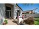 Charming front entrance with cozy seating area, beautiful flowers and manicured landscaping at 3411 S Vine St, Chandler, AZ 85248