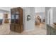 Welcoming hallway with staircase, decorative niche, leading to the kitchen and living areas at 3411 S Vine St, Chandler, AZ 85248