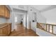 Upstairs hallway featuring hardwood floors and custom built-in storage at 3411 S Vine St, Chandler, AZ 85248