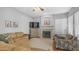 Inviting living room featuring a fireplace, hardwood floors and comfortable seating at 3411 S Vine St, Chandler, AZ 85248