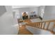 Open floor plan living area showcasing hardwood floors, a comfortable sofa, and stylish decor at 3411 S Vine St, Chandler, AZ 85248