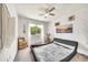 This bedroom is bright and airy, featuring ample natural light and a comfortable bed at 3912 E Rockwood Dr, Phoenix, AZ 85050