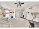 The main bedroom features a comfortable bed, TV, closet space, and soothing decor at 3912 E Rockwood Dr, Phoenix, AZ 85050
