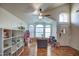 Inviting living room featuring wood floors, high ceilings, and generous windows at 4350 E Abraham Ln, Phoenix, AZ 85050
