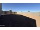 View of a spacious backyard with block wall at 4439 S 95Th Dr, Tolleson, AZ 85353