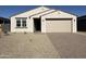 Charming single-story home with a two-car garage and low maintenance desert landscaping at 4439 S 95Th Dr, Tolleson, AZ 85353