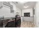 This spacious laundry room has modern washer and dryer appliances, along with extra storage at 4839 W Juniper Ave, Glendale, AZ 85306