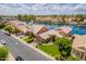 Stunning aerial view of a waterfront property with lush landscaping, private docks, and serene water views at 518 S Bay Shore Blvd, Gilbert, AZ 85233