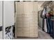 Custom walk-in closet with built-in drawers, shelving, and ample hanging space at 518 S Bay Shore Blvd, Gilbert, AZ 85233