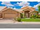 Charming single-story home featuring a stone-accented facade, tile roof, and well-manicured landscaping at 518 S Bay Shore Blvd, Gilbert, AZ 85233