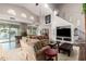 Bright living room with vaulted ceilings, hardwood floors, and large windows overlooking the waterfront at 518 S Bay Shore Blvd, Gilbert, AZ 85233