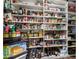 Walk-in pantry with ample shelving stocked with various food items and beverages at 518 S Bay Shore Blvd, Gilbert, AZ 85233
