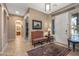 Welcoming foyer with tile flooring, a comfortable bench, and a view of the hallway at 5813 E Ashler Hills Dr, Cave Creek, AZ 85331