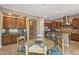 This kitchen has granite countertops, an island with bar stool seating, and adjacent breakfast area with a colorful round table at 5813 E Ashler Hills Dr, Cave Creek, AZ 85331