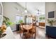 Charming dining area boasts natural light and flows into the kitchen, perfect for casual meals at 6335 E Brown Rd # 1084, Mesa, AZ 85205