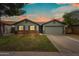 Charming home with well-maintained lawn and inviting curb appeal, enhanced by beautiful sunset at 6335 E Brown Rd # 1084, Mesa, AZ 85205