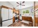 Well-lit kitchen features stainless steel appliances and wood cabinetry for a modern feel at 6335 E Brown Rd # 1084, Mesa, AZ 85205