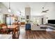 Bright open-concept living room flows seamlessly into the kitchen and dining area, creating a welcoming and spacious atmosphere at 6335 E Brown Rd # 1084, Mesa, AZ 85205