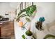 Stylish living room décor featuring live plants and creative artwork at 6335 E Brown Rd # 1084, Mesa, AZ 85205