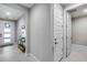 Inviting entryway with a modern front door, stylish decor, and neutral color palette at 6983 W Andrea Dr, Peoria, AZ 85383