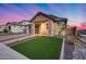 Charming single-Gathering home with stone facade, covered porch, and well-manicured lawn at 6983 W Andrea Dr, Peoria, AZ 85383