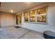 Covered patio with a view into the home showcases a seamless blend of indoor/outdoor living and entertainment space at 6983 W Andrea Dr, Peoria, AZ 85383