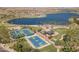 Aerial view of Estrella community park with lake, sport courts, and ramadas at 7659 S 164Th Ln, Goodyear, AZ 85338