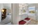 Serene bathroom boasts dual vanities, soaking tub, mountain views, and a separate water closet at 7659 S 164Th Ln, Goodyear, AZ 85338