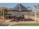 Shaded community playground near the lake with picnic area at 7659 S 164Th Ln, Goodyear, AZ 85338