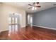 Staged living room featuring hardwood floors, furniture, and open floor plan at 8149 N 13Th Pl, Phoenix, AZ 85020