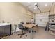 Large room featuring a work table, sink, and built-in shelves, offering a flexible space for various activities at 815 W Juniper Ln, Litchfield Park, AZ 85340