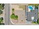 Aerial view of property showcasing backyard pool and landscaping with a clean roof and well-maintained surroundings at 8202 E Coolidge St, Scottsdale, AZ 85251