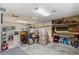 Spacious basement offers shelving, a workbench, laundry appliances, and ample storage space at 8202 E Coolidge St, Scottsdale, AZ 85251