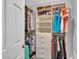 Organized closet with shelving and storage solutions, optimizing space for clothing and accessories at 8654 W Melinda Ln, Peoria, AZ 85382