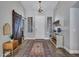 Bright foyer featuring a rustic sliding barn door and stylish decor at 8654 W Melinda Ln, Peoria, AZ 85382
