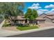 Charming single-story home featuring a well-manicured lawn and a paver driveway at 8654 W Melinda Ln, Peoria, AZ 85382