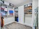 Spacious walk-in closet featuring custom shelving and ample storage for clothing, shoes, and accessories at 8654 W Melinda Ln, Peoria, AZ 85382